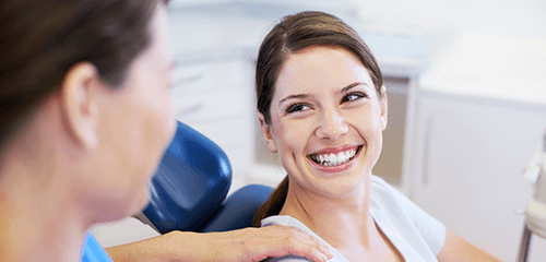 Woman smiling at dentist